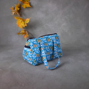 Barrel Handbags Blue with Yellow Prints.